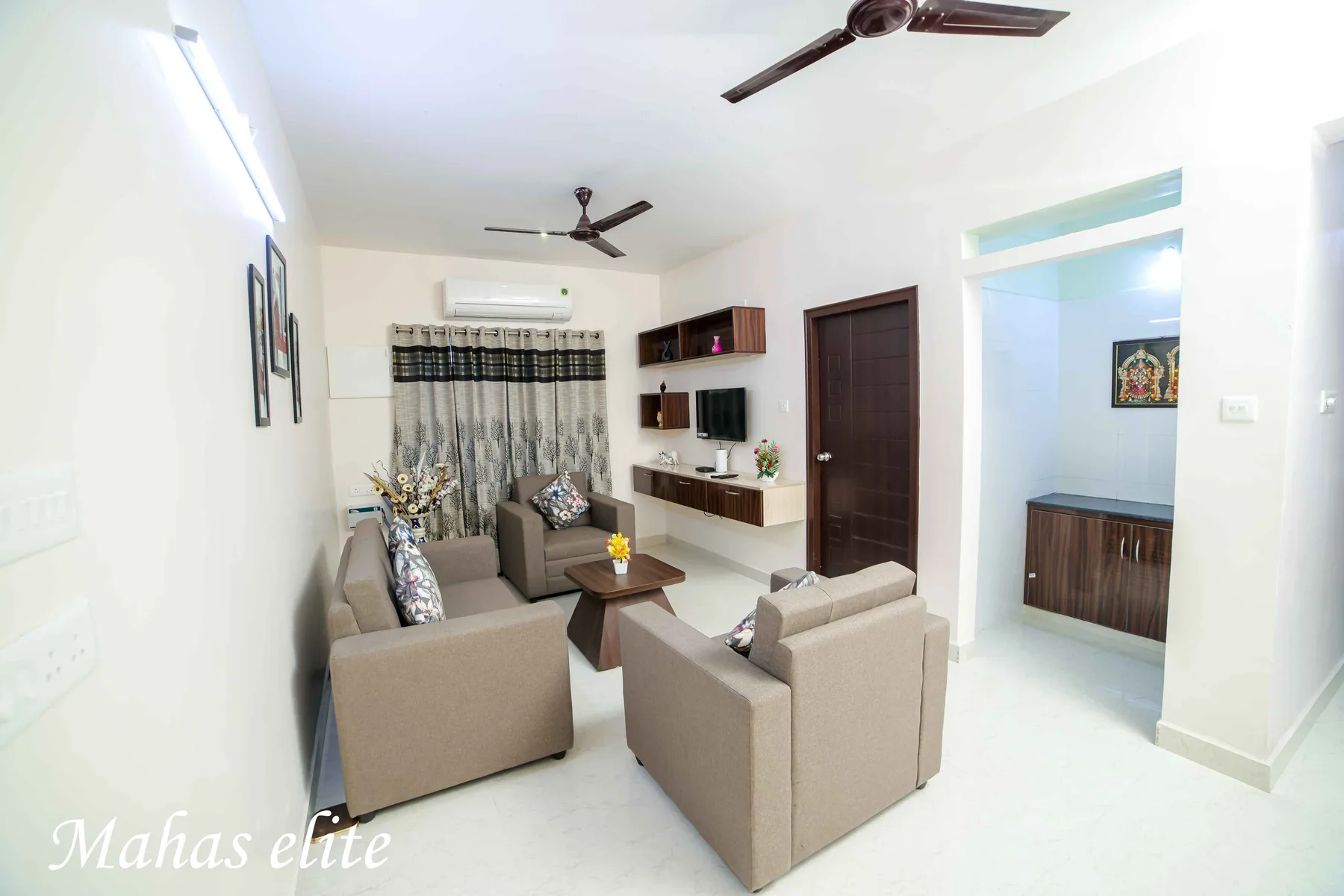 Air-conditioned living room at Mahas Elite 2BHK family apartment in Tirupati
