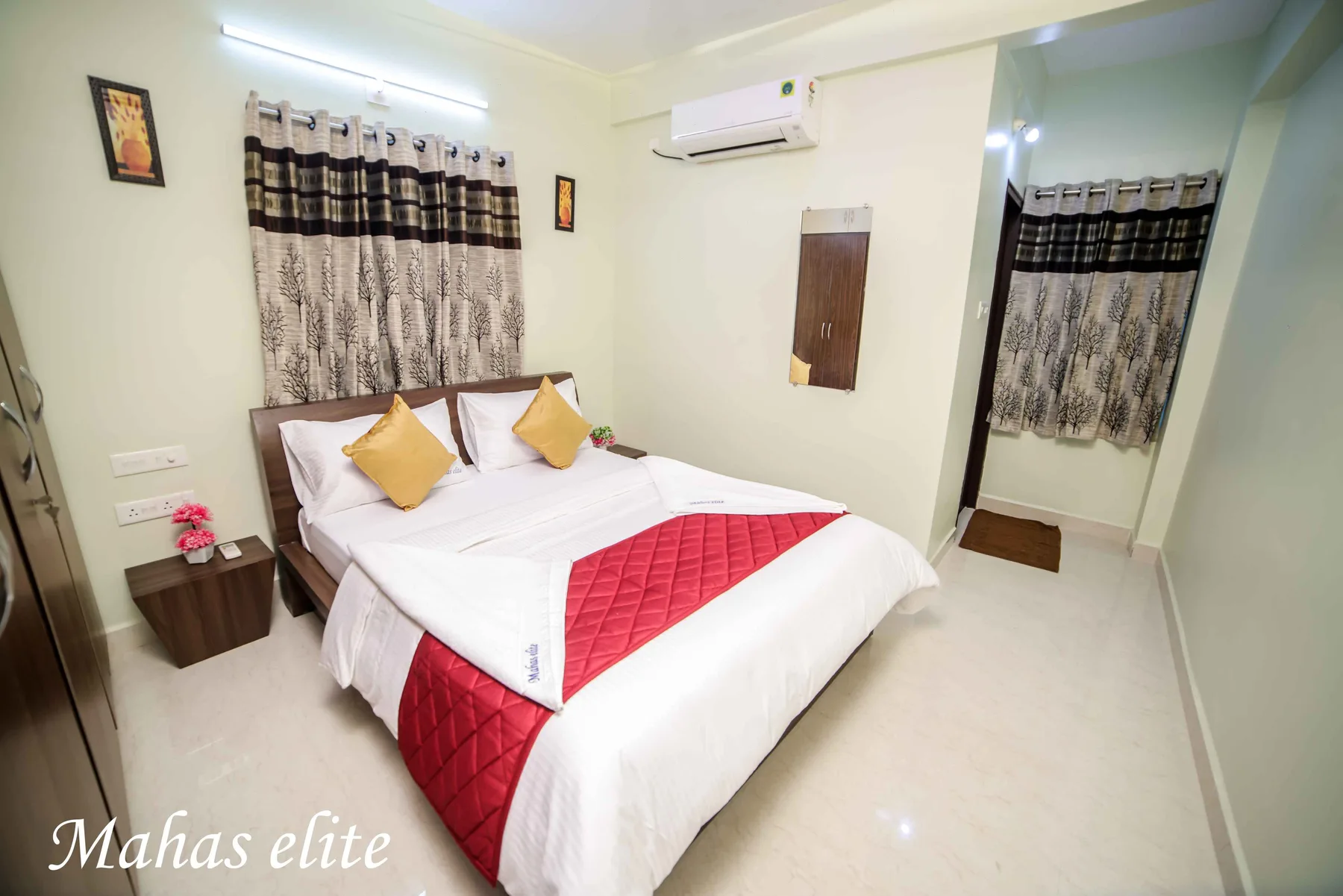 Spacious air-conditioned bedroom at Mahas Elite 2BHK apartment
