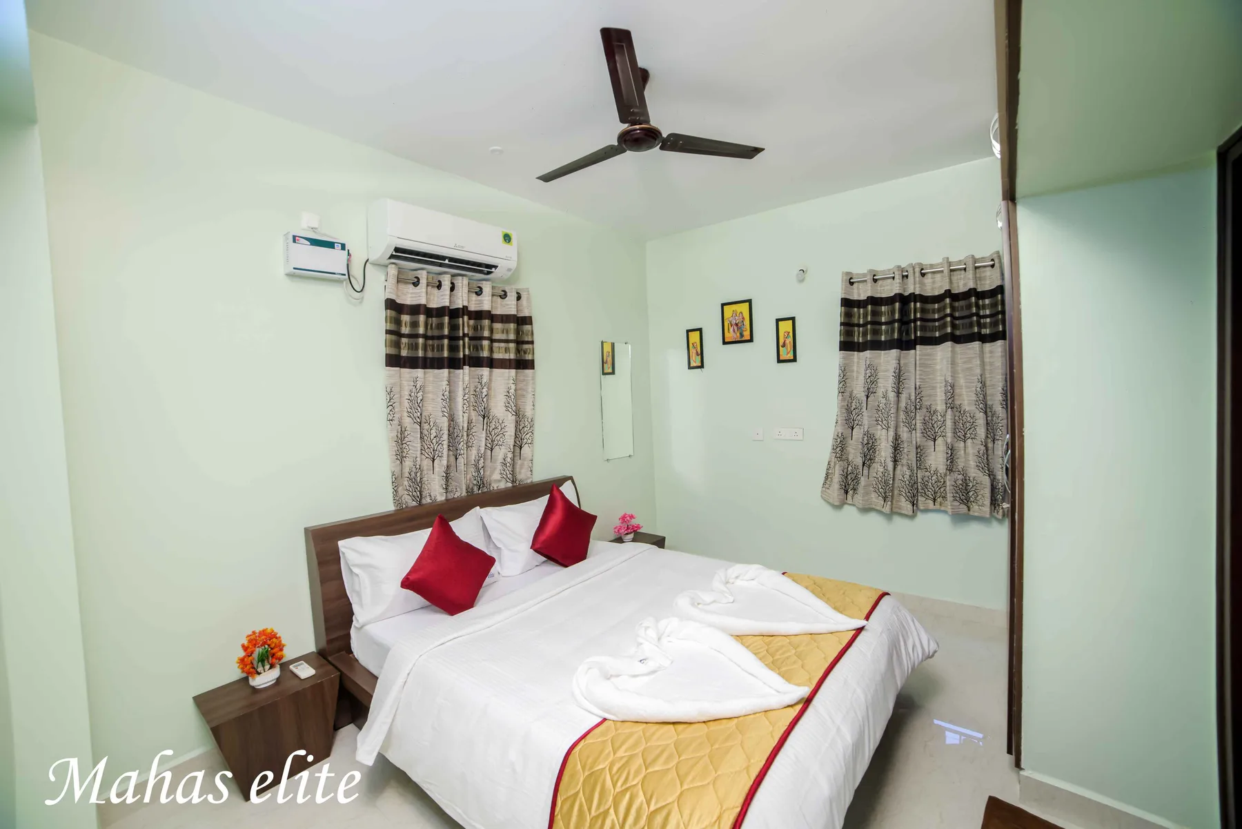 Second air-conditioned bedroom at Mahas Elite 2BHK family apartment
