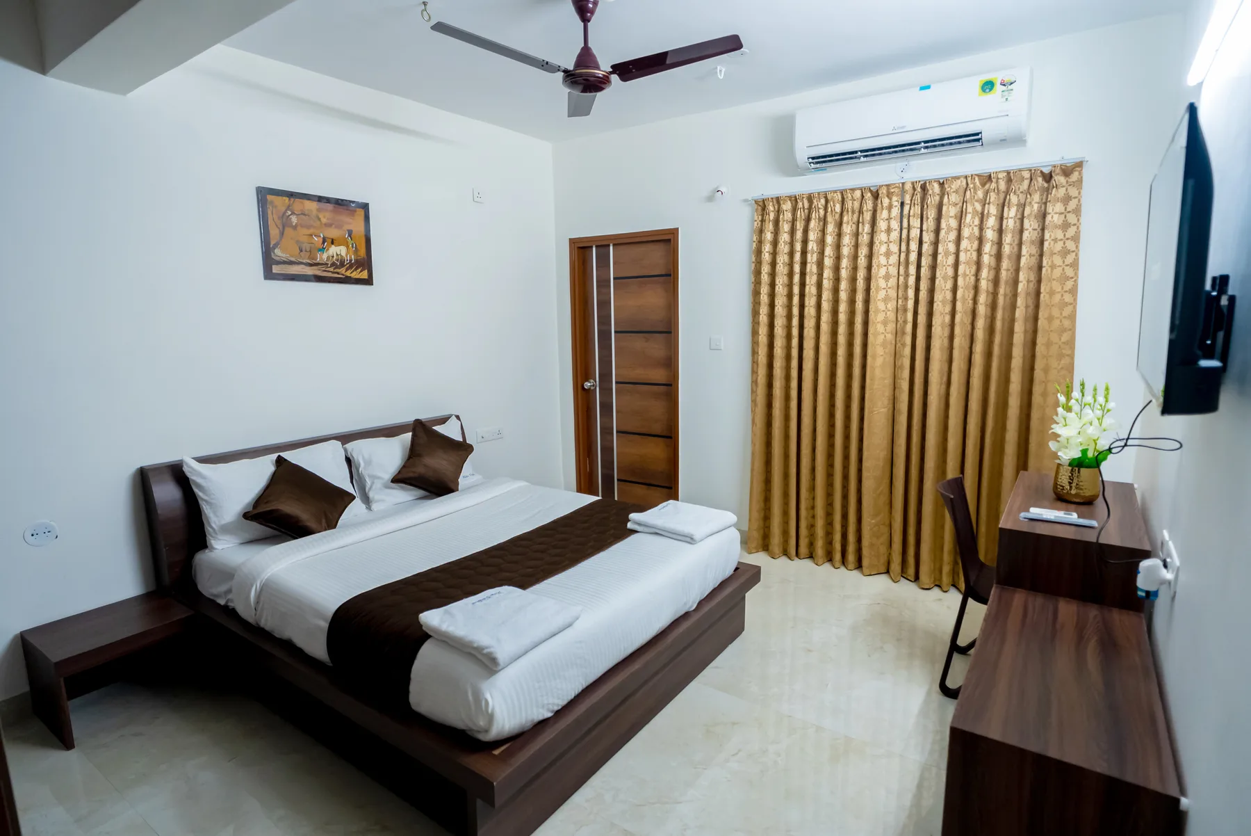 Air-conditioned bedroom with comfortable family accommodation at Mahas Vrindavan