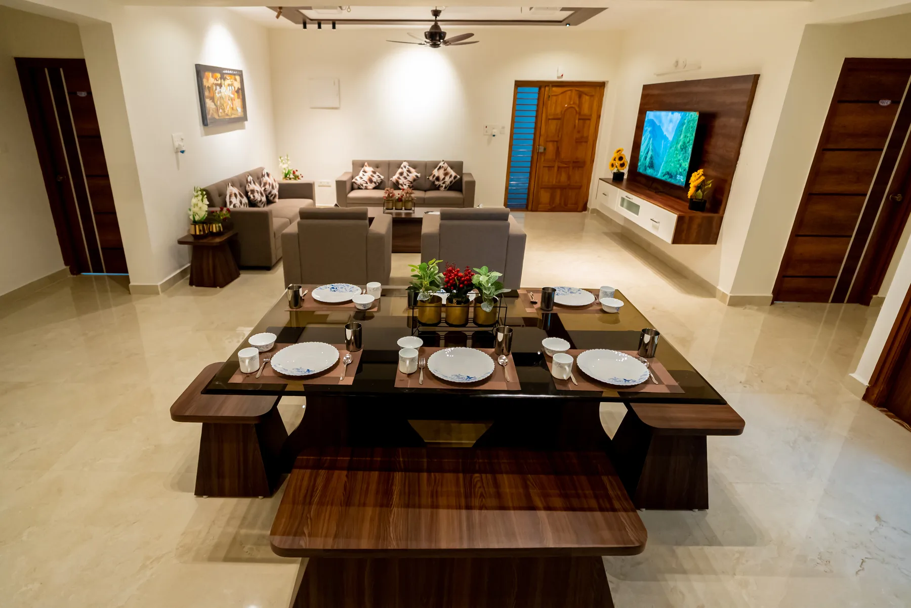 Dining table and chairs at Mahas Vrindavan family apartment