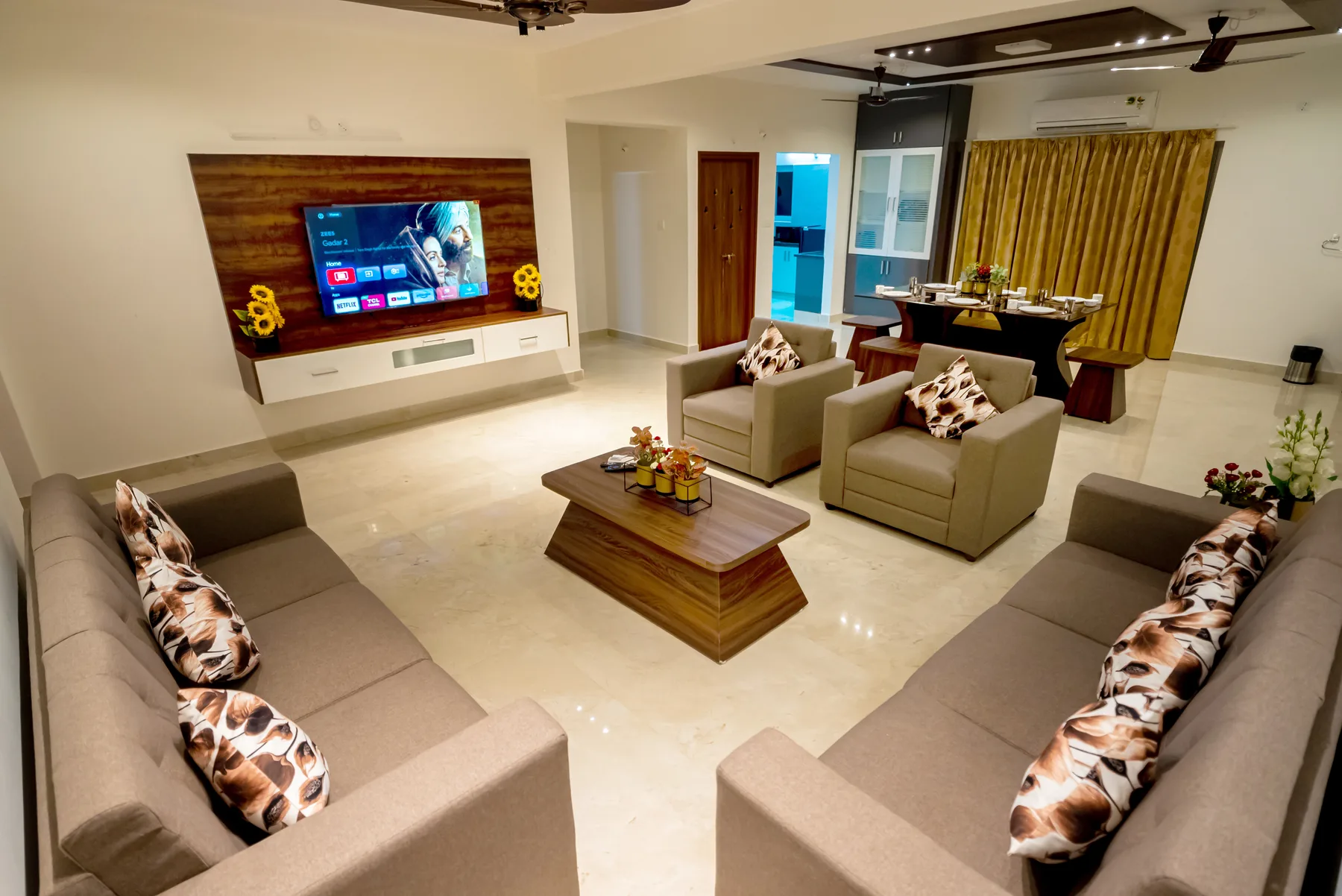 Spacious air-conditioned living room at Mahas Vrindavan 3BHK apartment in Tirupati