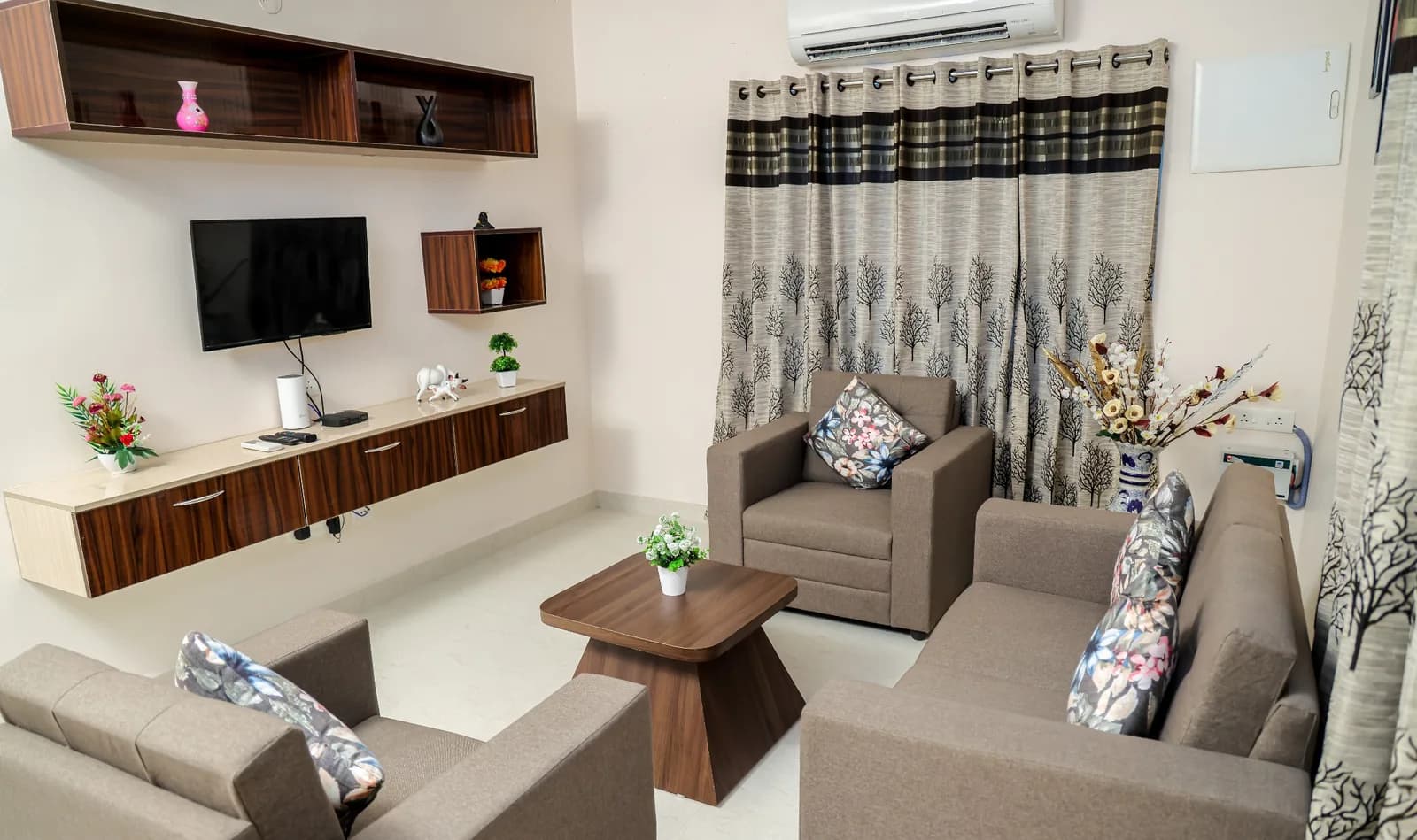Air-conditioned living room at Mahas Elite 2BHK family apartment in Tirupati